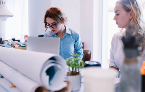 Print experts reviewing business collateral